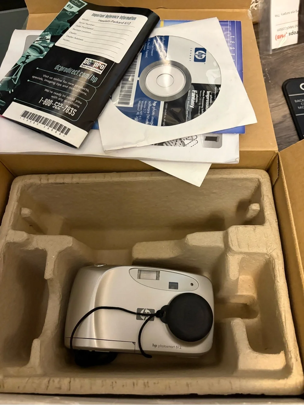 HP Photosmart 612 Digital Camera in Silver with Black Wrist Strap